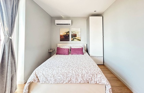 Aveiro Apartment | Modern Apartment in Aveiro with AC, WiFi, fitness room