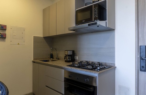 Papare Apartment | Modern Apartment with Pool, Beach Access & Nature Views.