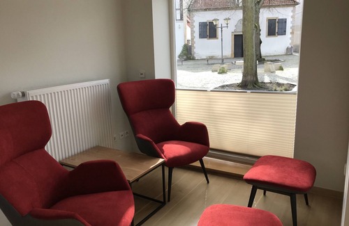 Bad Essen Apartment | Modern apartment with a fireplace in a listed half-timbered house on the market square