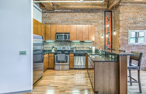 Downtown West Apartment | Modern Downtown Loft - Walk to the City Museum!