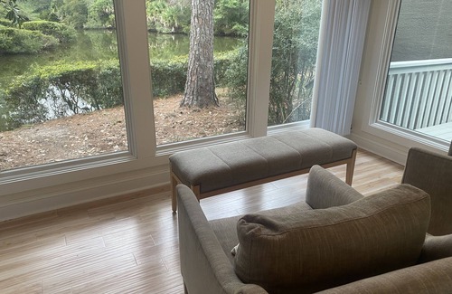 West Beach Cottage | Modern Lagoon View Steps from Beach Pool & Golf