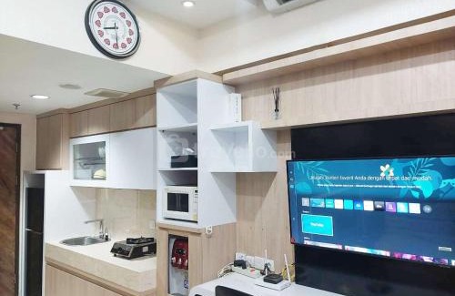 Catur Tunggal Apartment | Modern Look 1BR at Uttara The Icon Apartment By Travelio
