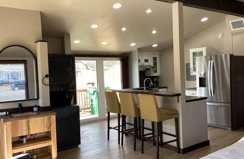 Cocoa House | Modern Ranch Studio With a Beautiful Round Porch