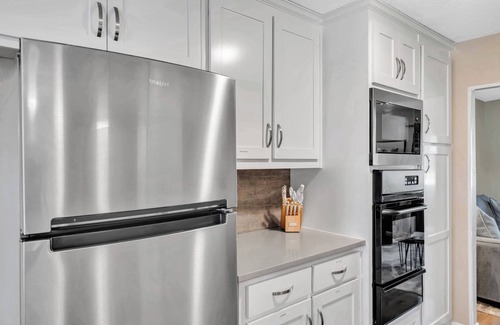 Bedford House | Modern Retreat with Pool, Hot Tub & Game Room