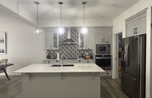 Sage Hill House | Modern single family home with home office in basement.