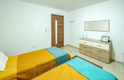 Luqa Apartment | Modern, spacious and easily accessible apartment in Luqa, Malta sleeps up to 6