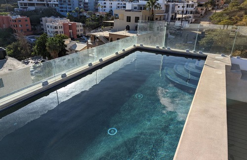 Libertad Condo | Modern, spacious condo w/pool. Close to Downtown.
