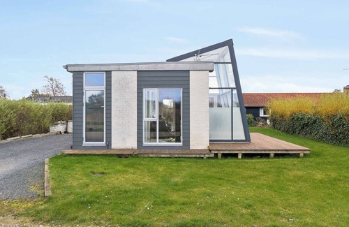 Frolunde House | Modern summer house with fantastic skylight.
