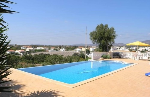 Quelfes House | Modern Villa with Pool, Garden and BBQ in an orange grove, near Olhão, Portugal