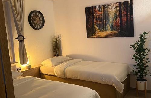 Kernstadt Apartment | Moderne Wohnung mit Waldflair und Kaffeegenuss