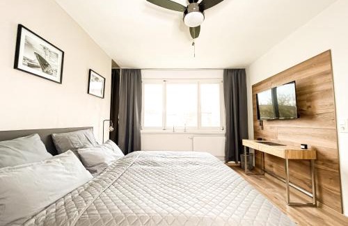 Eutritzsch Apartment | Modernes, mediales Apartment, Nähe der Neuen Leipziger Messe, bis vier Personen