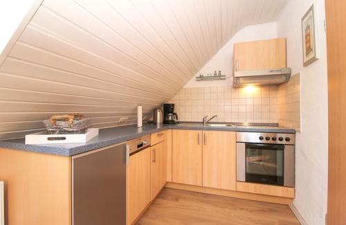 Greetsiel Apartment | Modernisierte Ferienwohnung im Obergeschoss für bis zu 2 Personen mit Hund