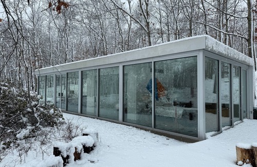 Water Mill House | Modernist Glass House nestled in tall pines and nature offering total privacy