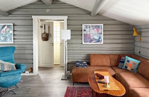 Vestre Slidre House | Modernized Log Cabin With Views Of The Mountains