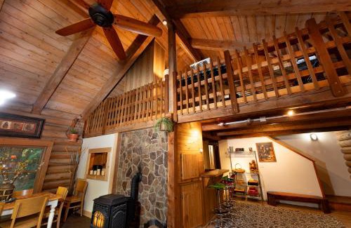 Blanchard House | Multi-Level Forest Lodge Near Silverwood with Vintage Ice Cream Parlor & Movie Theater