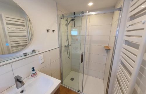 Carolinensiel House | Murmel 4 - Strandkorb, Wallbox, WLan, Kamin