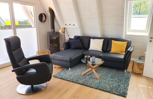 Carolinensiel House | Murmel 4 - Strandkorb, Wallbox, WLan, Kamin