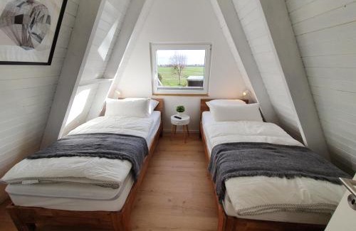 Carolinensiel House | Murmel 4 - Strandkorb, Wallbox, WLan, Kamin