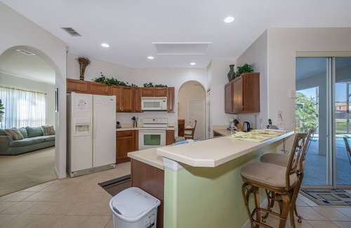 Crescent Lakes House | Near Disney Luxury Lakeside Villa with Spa and Wireless Internet