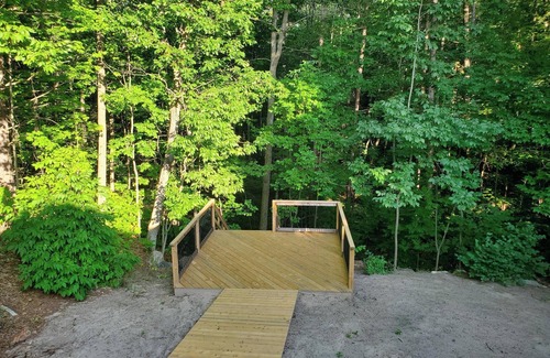 Wymbolwood Beach Cottage | Near Sandy Beach, Comfy Cottage - Multi leveled Deck with Woodland Backdrop