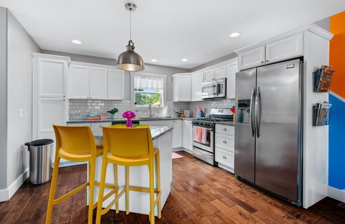 Traverse City Apartment | Neon Nest 3BR Townhome Near Downtown Beach Wineries