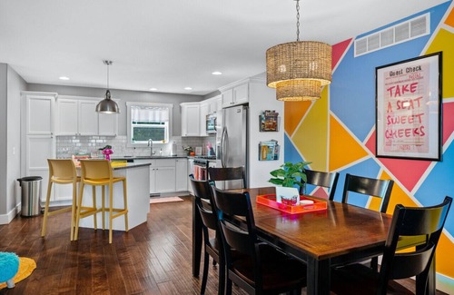 Traverse City Apartment | Neon Nest 3BR Townhome Near Downtown Beach Wineries