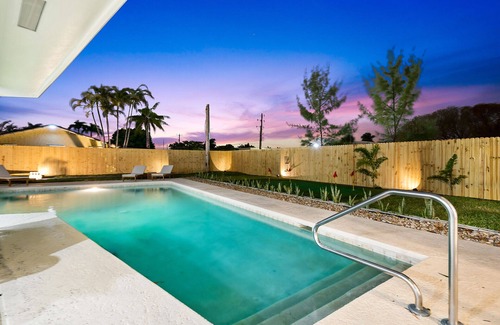 Villages of Palm Beach Lakes House | NEW 6BR Beach Resort-Style Game House! Heated Pool