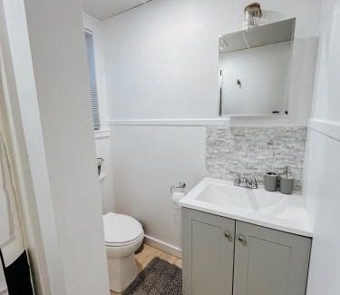 Laconia Apartment | NEW! Cozy and Modern unit with Hot tub
