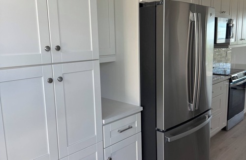 Sanibel House | New Cyprina Unit #2 – a fully renovated, Serena & Lily–inspired townhome on Sanibel’s sought-after East End. This luxury beach retreat seamlessly blends coastal elegance with modern comfort, offering breathtaking direct water views from every room.