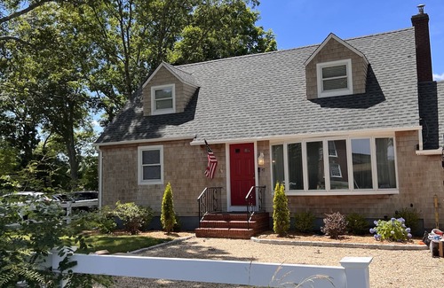 Westhampton House | New deck, pool liner, ac, doors, hardwoods, paint, electric fireplace, etc.