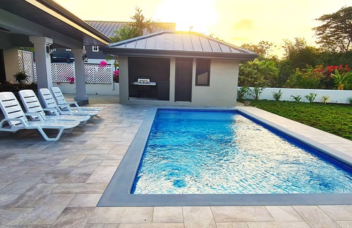 Crown Point Villa | New spacious luxury 4-bedroom villa in gated development close to beaches.