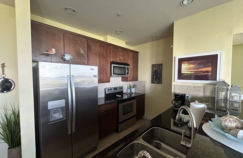 Galveston Condo | New to rentals at Pointe West. On the Sunset Pool/Lazy River and viewing WestBay