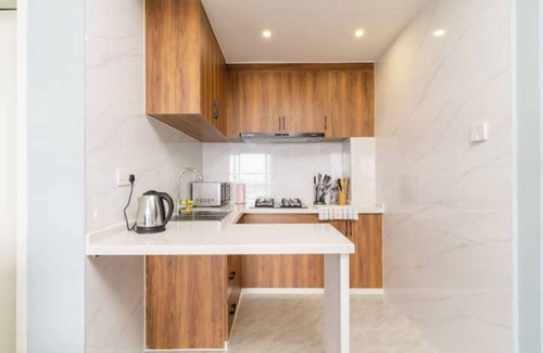 Kilimani Apartment | Ngong Hills Views from the City Center/Pool/Gym