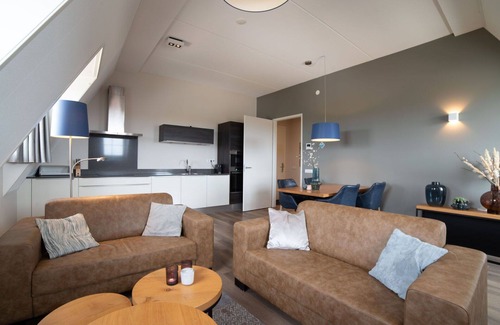 Colijnsplaat Apartment | Nice apartment for 4 guests with hot tub, WIFI, TV, balcony and parking