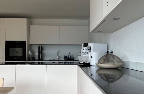 Spiez Apartment | Nice apartment for 12 people with WIFI, TV, balcony and pets allowed