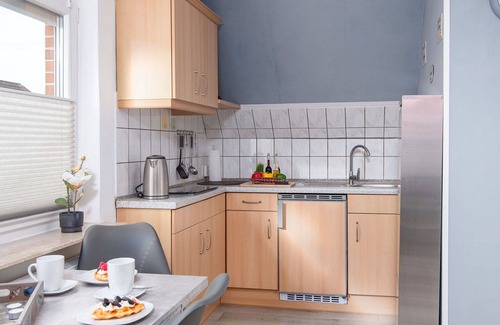 Norddeich Apartment | Nice apartment for 3 guests with WIFI, TV, balcony and parking