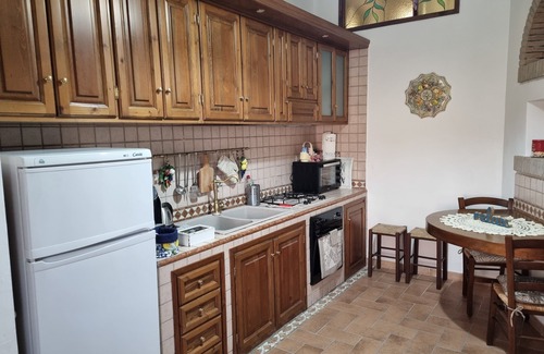 Tuscania House | Nives Holiday House, home in the ancient castle walls in the historic center.