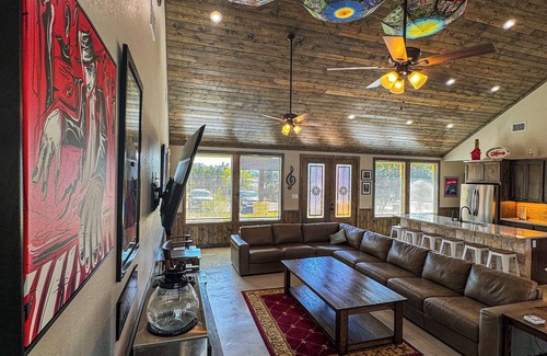 Sabinal House | NOLA styled 6-bedroom home in Concan. Sleeps 36 with AC, WiFi, Pool, Hot Tub