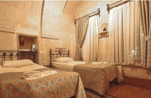 Goreme House | Nomads - Traditional Arch Stone room at the center