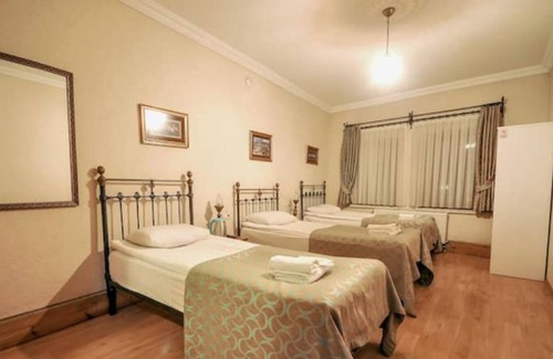 Goreme House | Nomads - Triple Room at the heart of Cappadocia