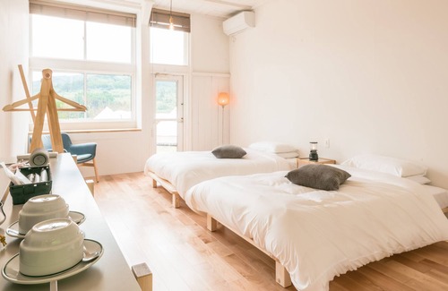 Goto Cottage | Nordisk Village Goto Islands Modern Room Renovated School Building