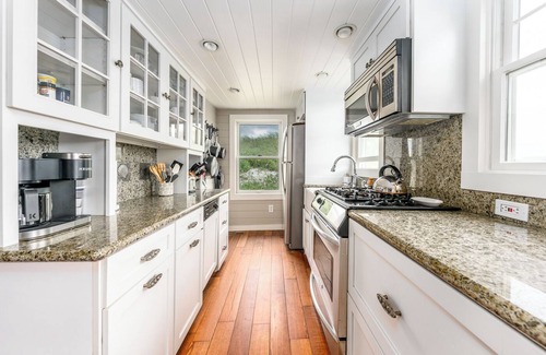 East Sandwich Cottage | Ocean front oasis nestled into the dune on a private East Sandwich beach.