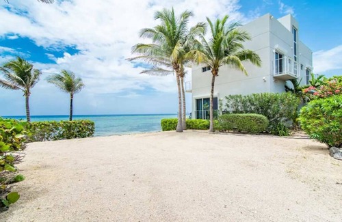 North Side House | Ocean's Edge: Beachfront Home with Rooftop Views