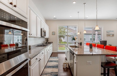 Frankford House | Ocean View Beach Club designer home with bikes, resort-style pool, sauna & gym