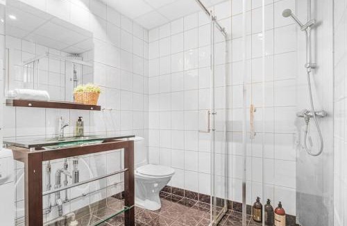 Sandviken Apartment | Ocean-view Haven: Take a swim from your window!