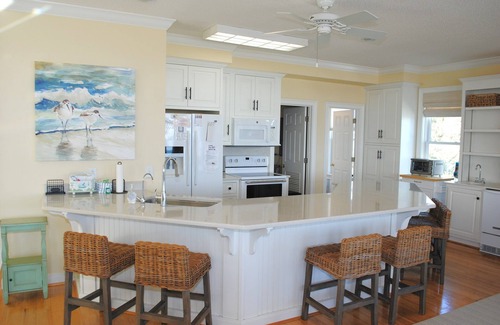Litchfield by the Sea House | Oceanfront Beach Home with pool access located within Charlestowne Grant community.