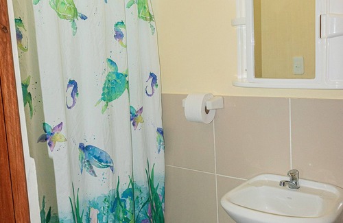 Coastal Region Hotel | Oceanfront Hostel - Balcony with amazing ocean sunset views, pool and Steam Room