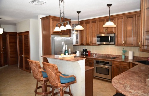 Maho Apartment | Oceanfront Paradise: Luxurious Penthouse with Spectacular Pools and Peloton