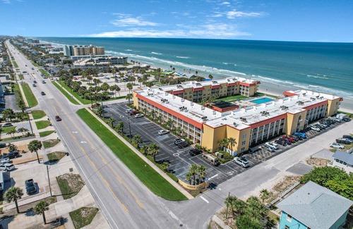 Point East Condo | Oceanfront , upscale, oceanfront condo with Olympic pool & beach access