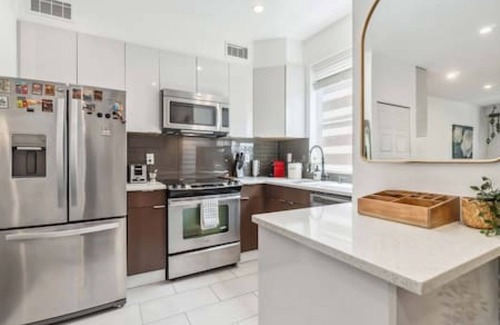 Grandview-Woodland House | Oceanside oasis + mountain view w/private rooftop